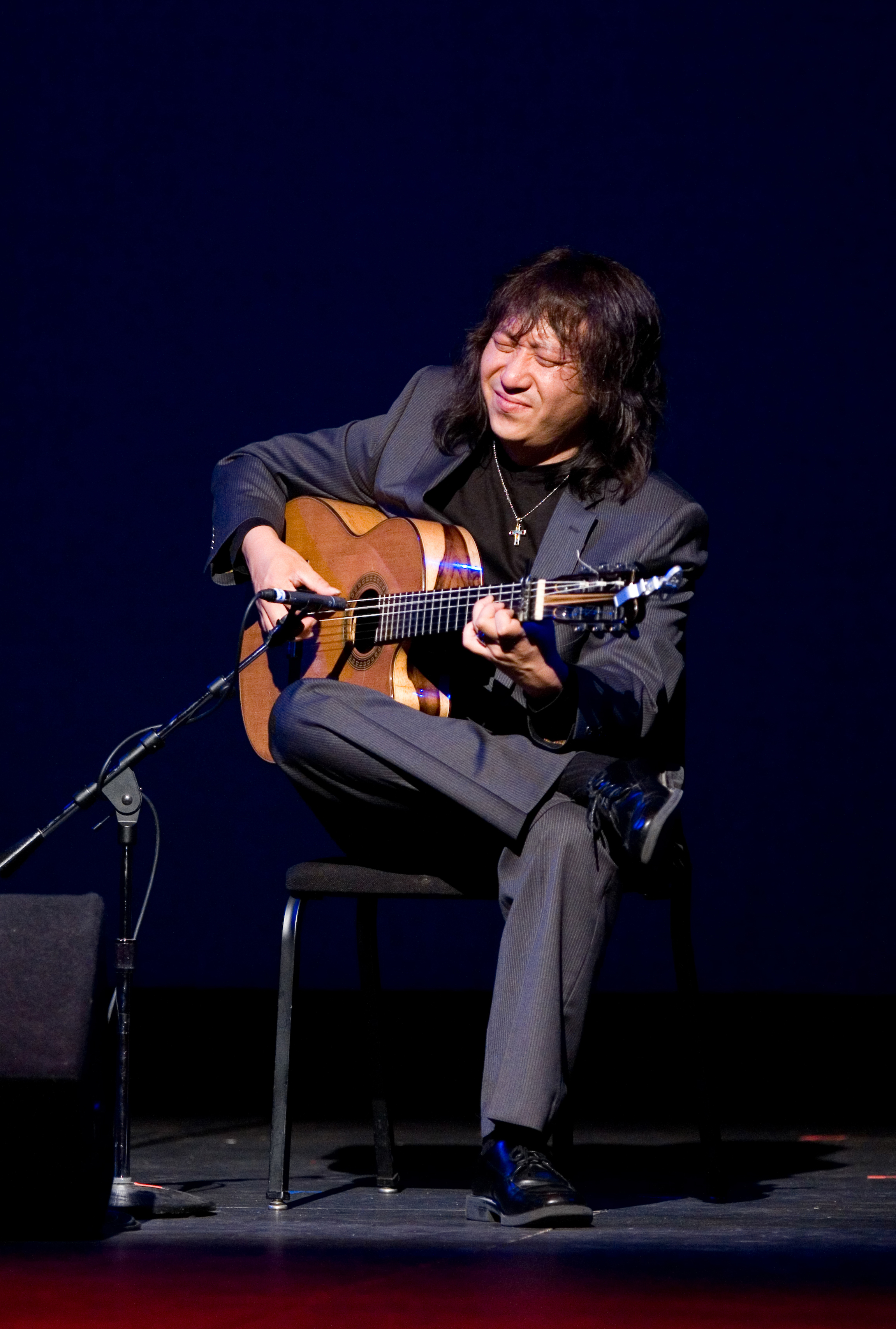 Flamenco guitarist Jose Tanaka performing solo guitar live
